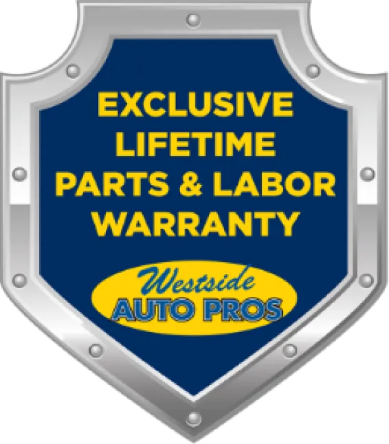 A silver and blue shield logo with yellow text that reads: Exclusive Lifetime Parts & Labor Warranty. Below is Westside Auto Pros in yellow and blue lettering on an oval background.