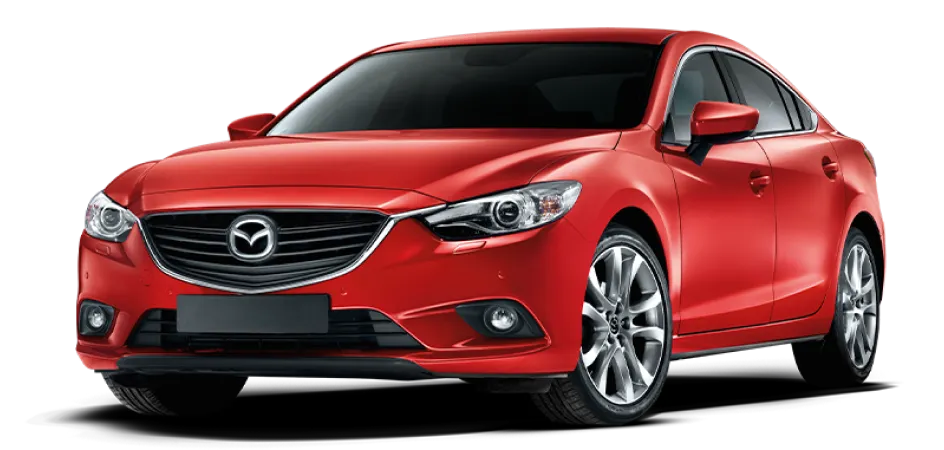 A red Mazda sedan is shown from a front-side angle, featuring a sleek design, prominent grille with the Mazda logo, sharp headlights, and silver alloy wheels.